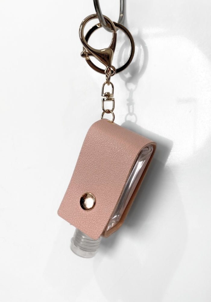 Portable Biotin Oil Keychain - Santana's Wigs & Hair Extensions, LLC - Light Pink