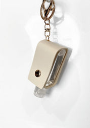 Portable Biotin Oil Keychain - Santana's Wigs & Hair Extensions, LLC - Ivory