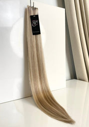 Santana’s Premium 100% Human Hair Genius Weft Extensions 24" | 100G - Santana's Wigs & Hair Extensions, LLC - 18/613 Pale Ash Blonde